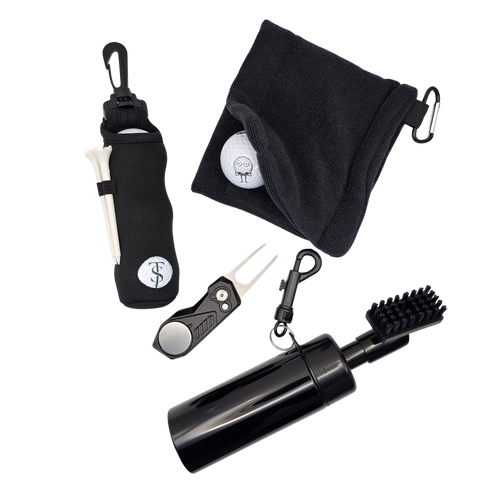 Golf accessories arranged together: black ball pouch, cleaning towel, divot tool with marker and spray brush.